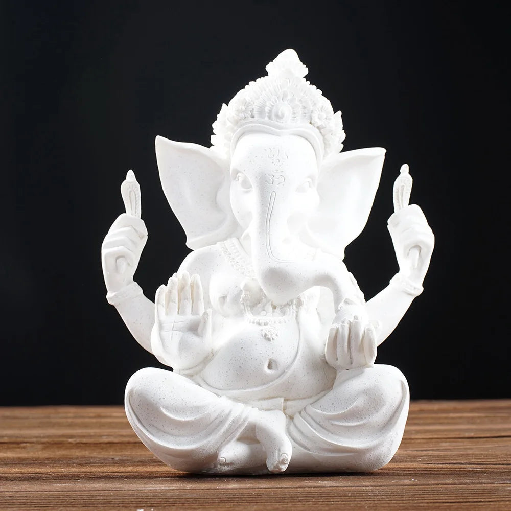 Ganesha Elephant God Statue in Sandstone or Resin (White). Perfect for meditation and home decor.