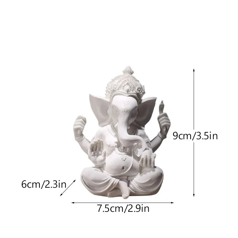 Ganesha Elephant God Statue in Sandstone or Resin (White). Perfect for meditation and home decor.
