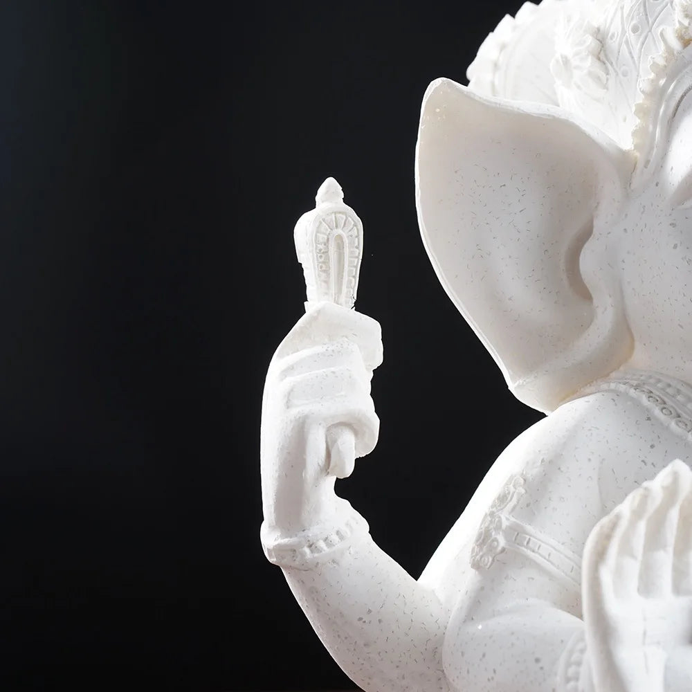 Ganesha Elephant God Statue in Sandstone or Resin (White). Perfect for meditation and home decor.