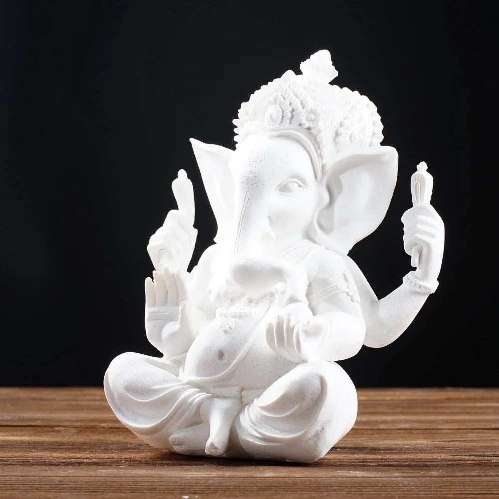 Ganesha Elephant God Statue in Sandstone or Resin (White). Perfect for meditation and home decor.